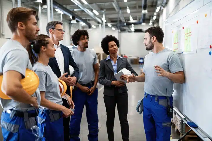 Employees planning for the year at work site communicate clear expectations.