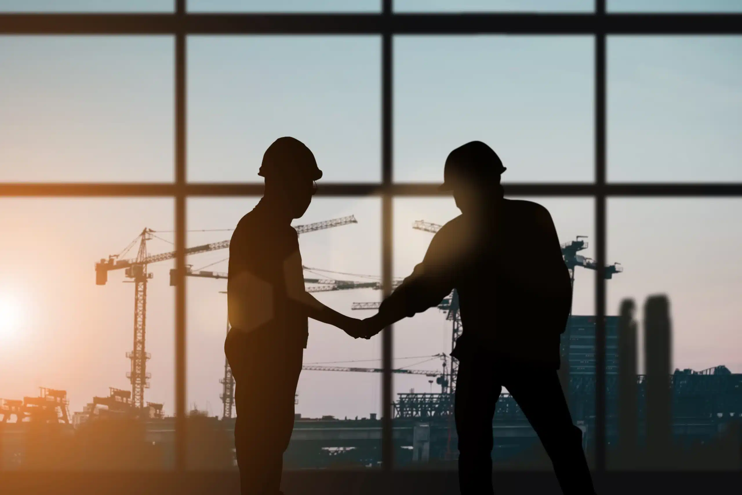 Handshake with effective employee feedback.